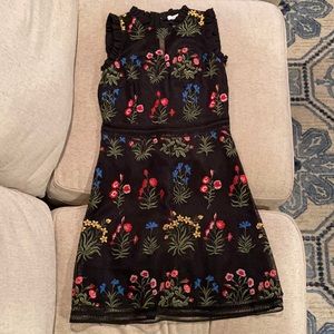 Never been worn black floral dress by Lucy Paris